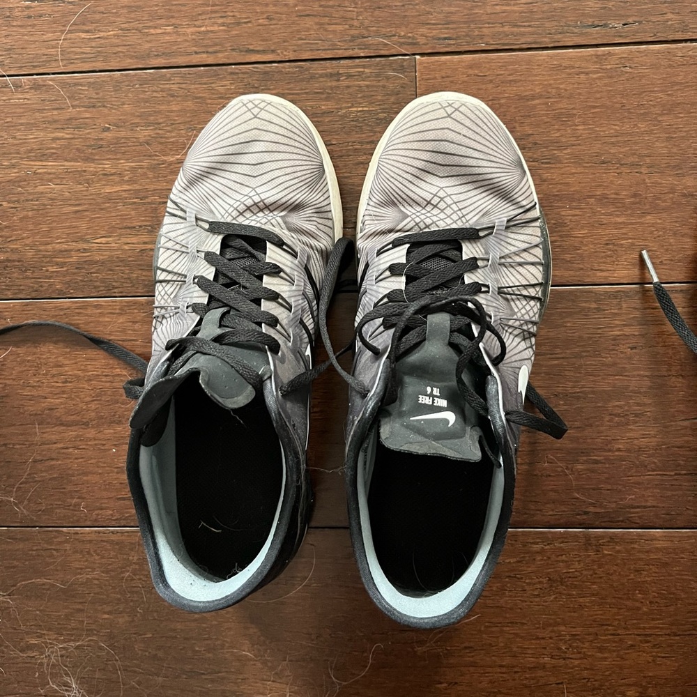TWO pairs of Nike Running shoes - size 7